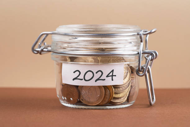 istock Glass jars with coins 1689139478