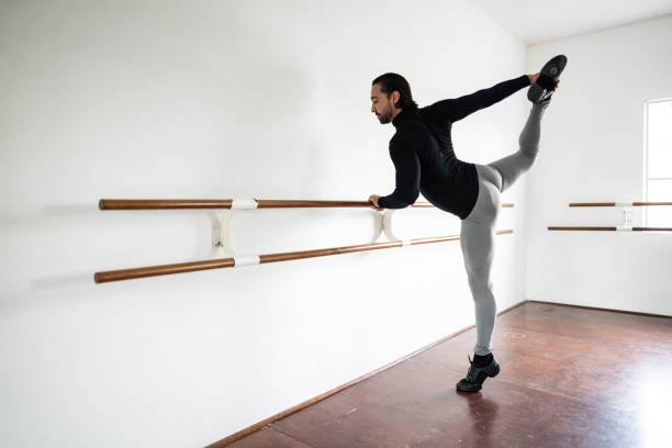 istock Mid adult man stretching at the dance studio 1689140567
