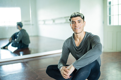 Portrait of a young man at the dance studio
