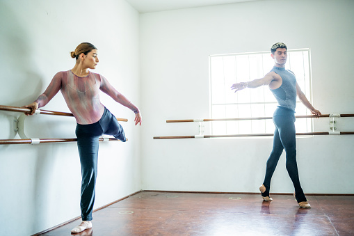 Students stretching at the dance studio