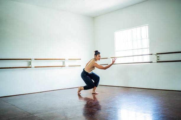 istock Young woman dancing at the dance studio 1689169807