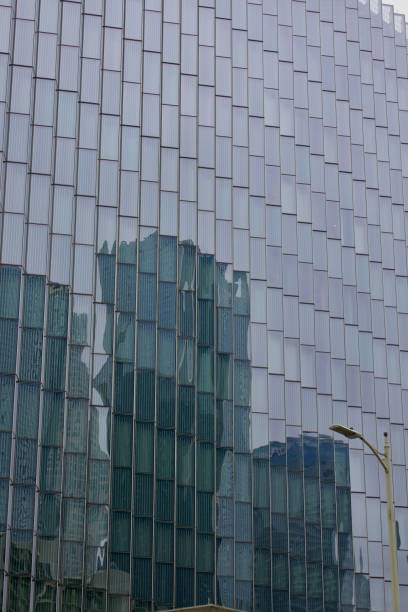 istock High rise reflecting on the mirror finish of another building 1689171949
