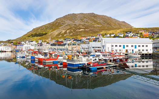 Idyllic fishing harbor and town Honningsvåg above the arctic circle near the North Cape in Norway