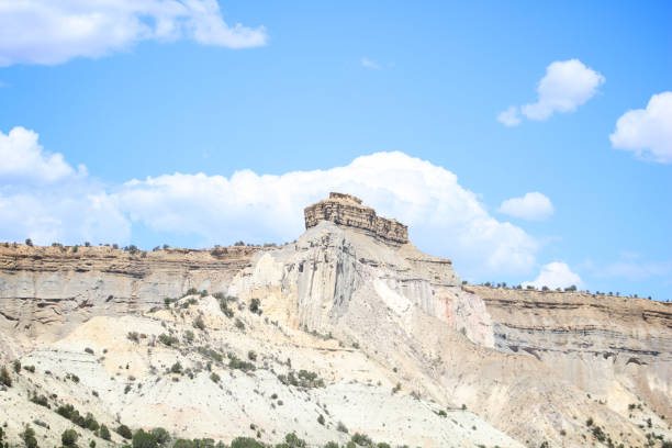 istock Rocky Wall Colorado Landscape with Blue Sky and White Clouds 1689184671