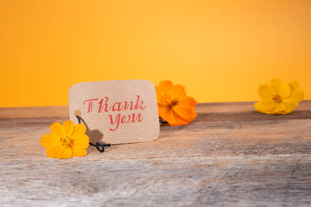 istock Thank you note on recycled paper tag. 1689196229
