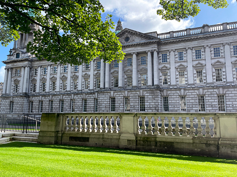 Stock photo showing exterior of the Portland stone Baroque Revival style architecture of Belfast City Hall, Donegall Square, Belfast, Northern Ireland.