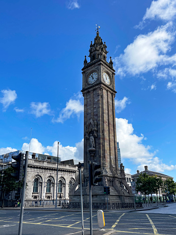 Stock photo showing The Albert Memorial Clock situated at Queen's Square in Belfast, Northern Ireland. The sandstone clock tower was built as a memorial to Queen Victoria's husband after a design competition that was won by architect W. J. Barre.