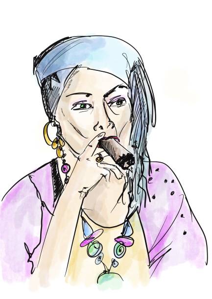 istock A woman with a cigar in ethnic clothing 1689215368