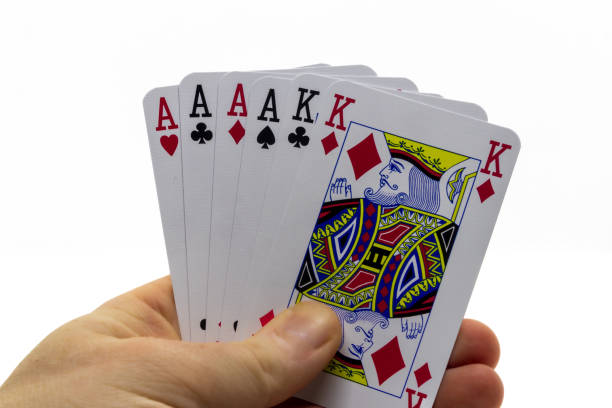 istock Human hand with full house cards 1689250530