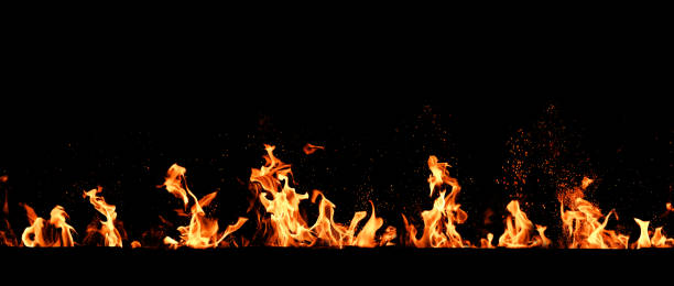 istock Blazing flame of fire on black background 1689315309