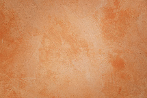 Orange wall with brush strokes as background