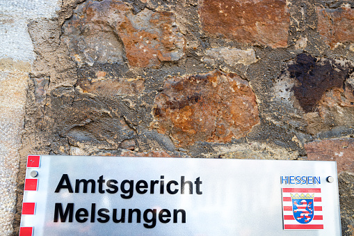melsungen, hesse, germany - 15 09 2023: a sign of the district court melsungen