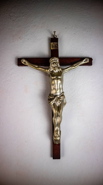 istock a cross hung on a white wall 1689513001