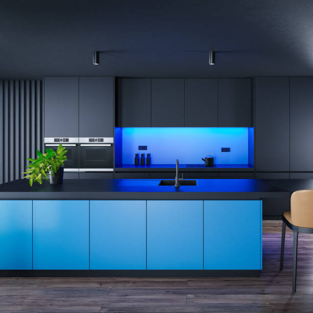 istock Black Modern minimalist kitchen with long island with stools. Dark materials. Blue LED light 1689533102