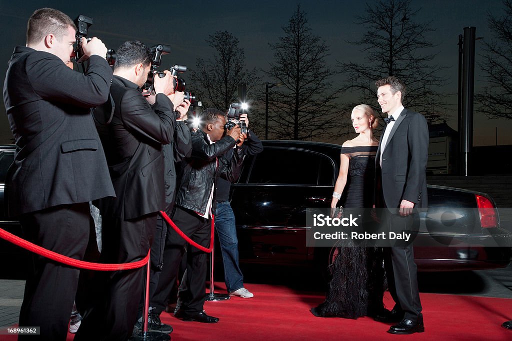 Celebridades Posando por paparazzi no tapete vermelho - Royalty-free Evento com Tapete Vermelho Foto de stock