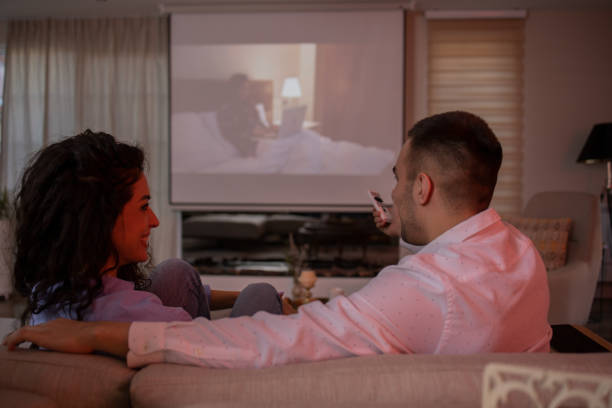 istock Couple is watching a movie. 1689648852
