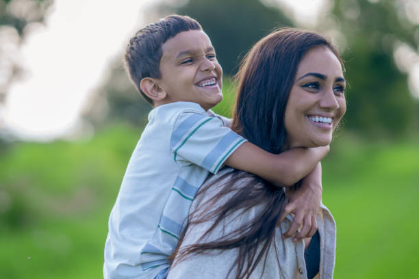 istock Piggyback Rides from Mom 1689650917