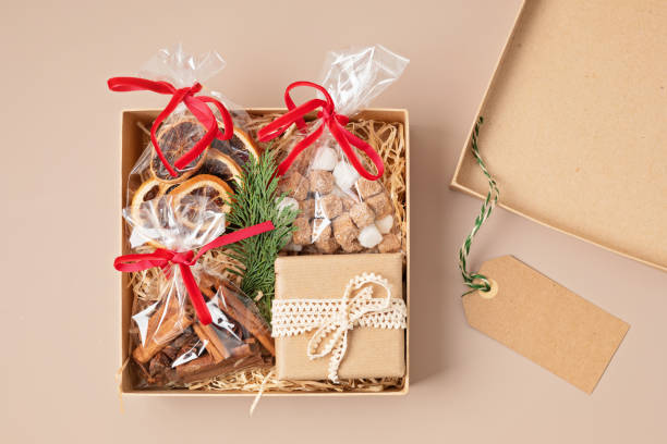 istock Refined Christmas gift box for culinary enthusiats with spices and kitchen utensils. Corporate or personal present for cooking lovers, foodies and gourmands. 1689673265