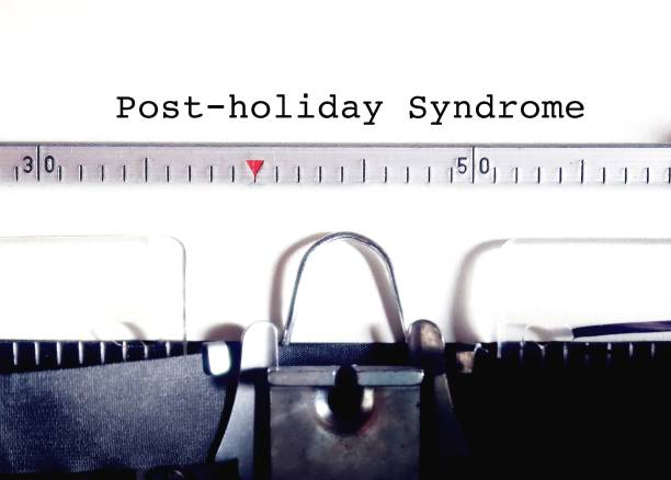 istock Typewriter with typed text - Post-holiday Syndrome, feeling hard to get back into work, physical or emotional stress and lack of enthusiasm after long holidays 1689702373