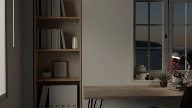 istock A copy space on a wooden tabletop in a modern contemporary home office workspace with a white wall 1689806525