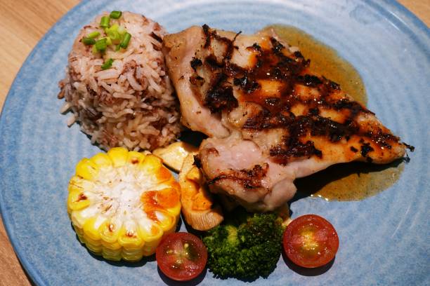 istock Chicken Barbecue Riceberry rice serving with vegetables 1689858158