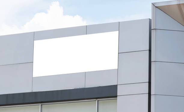 istock Mock up white background billboard on building. Clipping path for mock up 1689874264