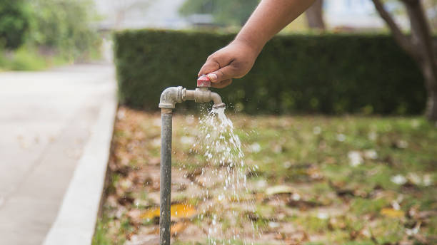 istock Old faucet outside the house dripping 1689937208