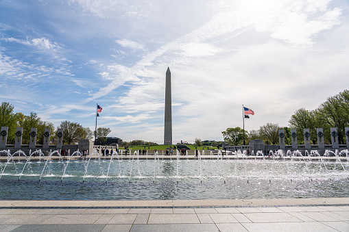 View of Washington monument and  World War II Memorial in beautiful sunny day, Washington D.C. USA.