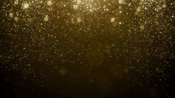 istock Particles gold glitter bokeh award dust abstract background 1689987458