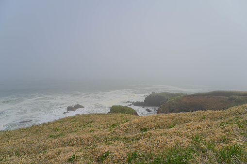 This picturesque view of the Pacific Ocean Shoreline at Ft Bragg California draws visitors from far and wide as this is a very important and famous travel destination especially the views with fog.