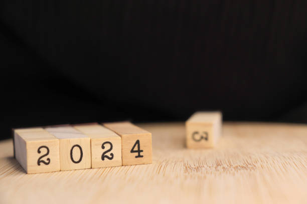 istock design with wooden cubes for new year 2024 with text space 1689990214