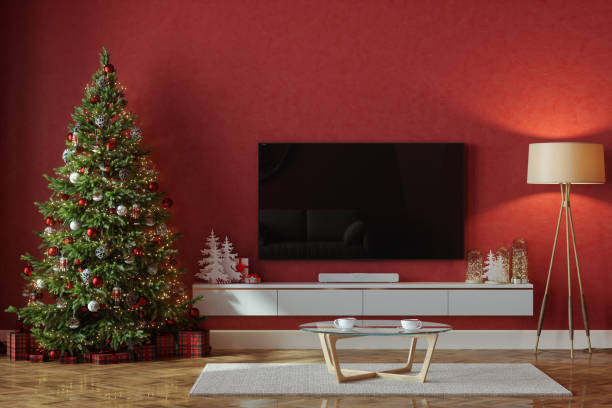 istock Living Room Interior With Christmas Tree, Ornaments, Gift Boxes, Television Set And Red Wall 1689990269