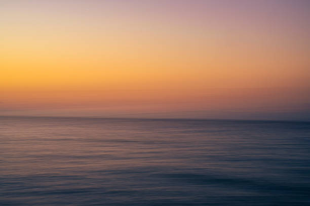 istock Intentional Camera Movement: Sunset over Ocean 1689991526