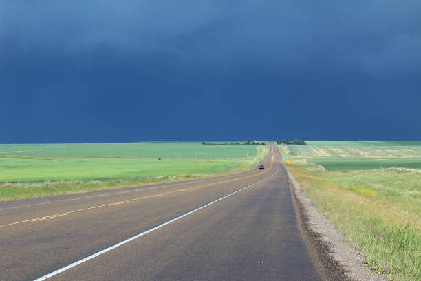 istock Incoming storm on the prairie highway 1689992233