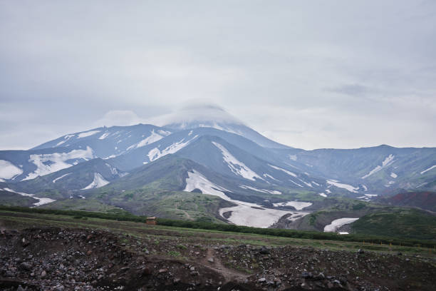 The foothills of the Avachinsky volcano on a cloudy day. Midsummer in Kamchatka.