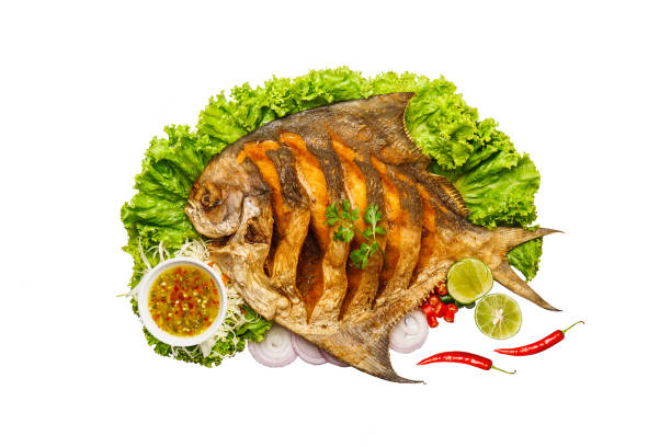 istock Deep Fried Pomfret with Fish Sauce isolated 1689995779