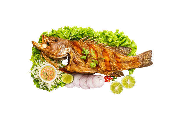 istock Fried Garoupa with Fish Sauce isolated 1689995842