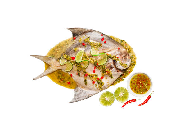 istock Steamed Pomfret with Chili and Lime Sauce isolated 1689995967