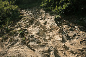 Rocks on a steep path in the area of the Vachkazets mountain range