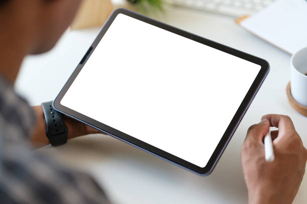 istock Young Asian man sitting on comfortable and using digital tablet. 1690020682