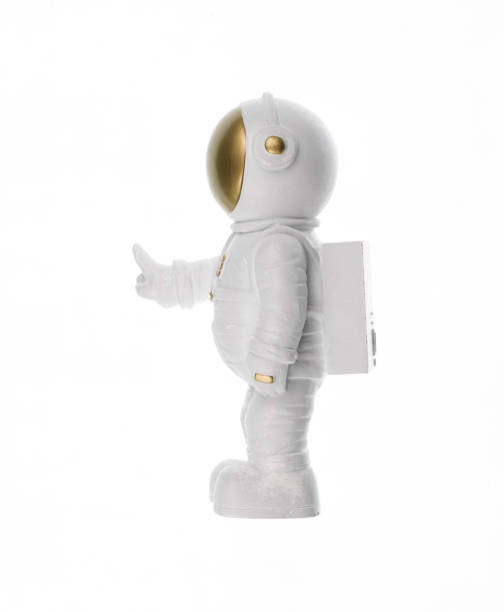istock astronaut toy isolated on white background 1690025546