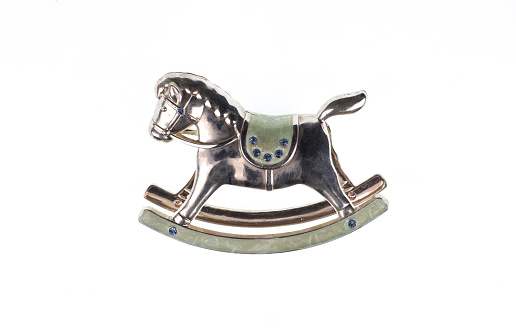 silver rocking horse toy isolated on white background