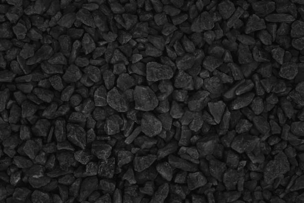 istock Natural stone pattern for background, black and grey stone gravel texture. 1690036726