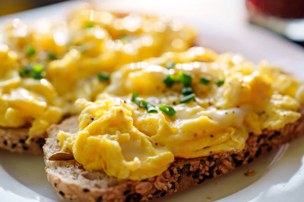 istock Fluffy and Buttery Scrambled Eggs Close-Up 1690099020