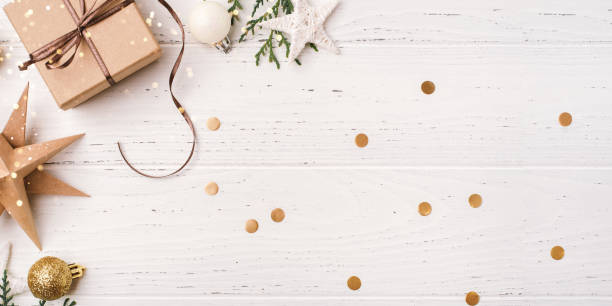 istock Festive Christmas background with gift box and Christmas decorations 1690114032