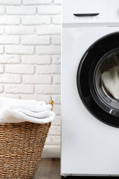 istock Modern white washing machine close up photo 1690119364