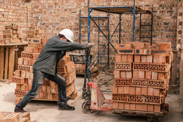 istock An experienced worker works on the construction of a brick house 1690125216