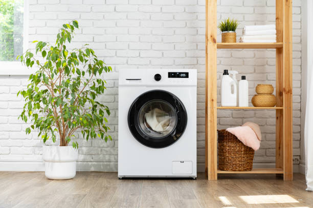 istock Modern white washing machine close up photo 1690138625