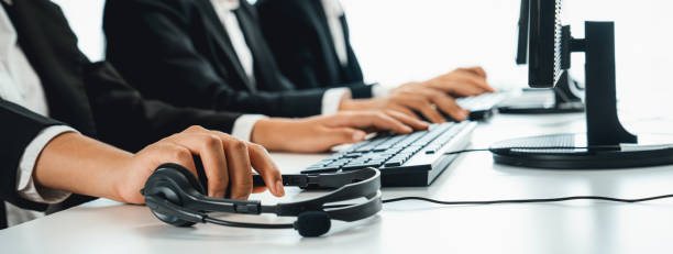 istock Call center wearing headset working in office for customer support oratory 1690140253