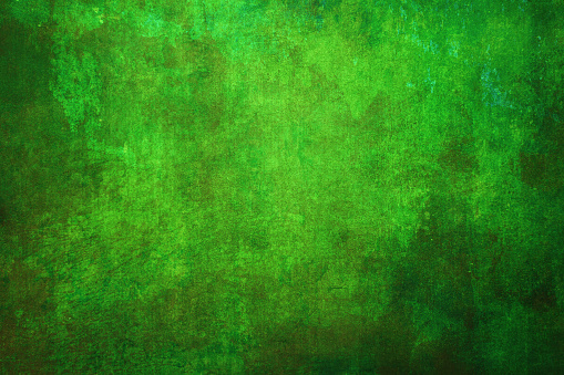 This background exhibits a captivating weathered green grunge texture, which lends it a distinct and aged character. The textural elements create a sense of depth and dimension, offering a unique backdrop for various design projects, adding a touch of rustic charm and visual intrigue.